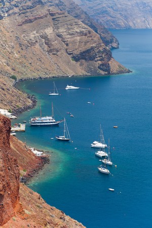 Santorini beautiful volcanic island in Greece landscape with blue churches, windmills and volcanic calderaの写真素材