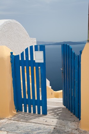Santorini beautiful volcanic island in Greece landscape with blue churches, windmills and volcanic calderaの写真素材
