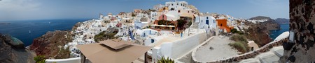 Santorini beautiful volcanic island in Greece landscape with blue churches, windmills and volcanic calderaの写真素材