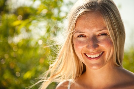 Young natural without makeup caucasian blond woman portraitの写真素材