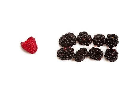 Ripe Black and red raspberries on white isolated backgroundの写真素材