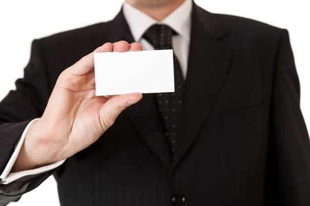 Business man holding blank card on white isolated backgroundの写真素材