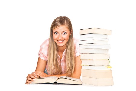Young adult caucasian woman with books isolated on whiteの写真素材