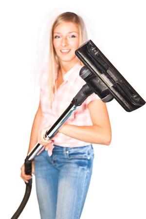 Woman in wedding veil with vacuum cleaner isolated on whiteの写真素材