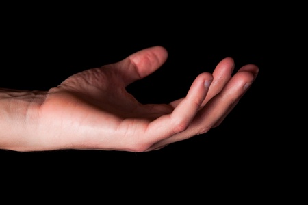 Male hand on black backgroundの写真素材