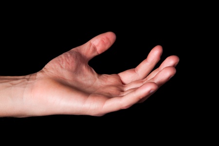 Male hand on black backgroundの写真素材