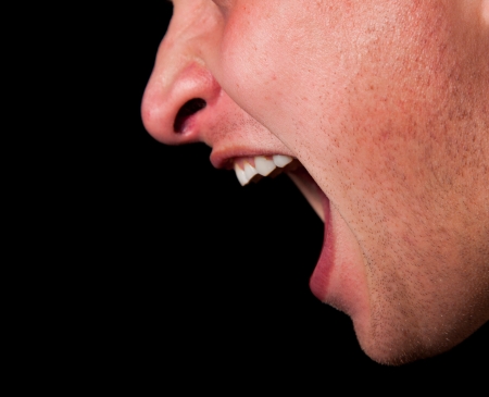 Yelling woman mouth closeupの写真素材