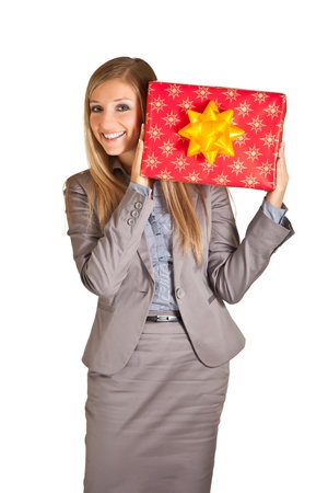 Blond caucasian woman in formal dress with gift boxes isolated on whiteの写真素材