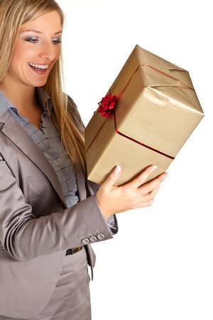 Blond caucasian woman in formal dress with gift boxes isolated on whiteの写真素材