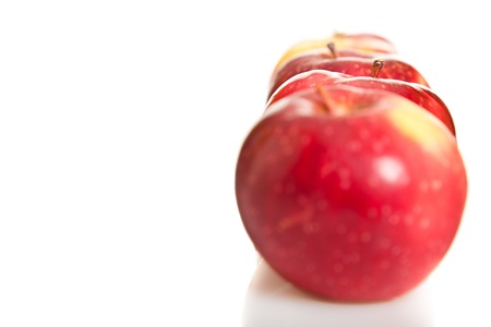 Fresh red juicy natural apples on white isolated background の写真素材