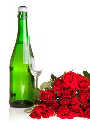 Valentine's day roses and champagne wine isolated on whiteの写真素材