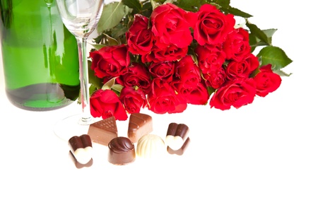 Valentine's day roses and champagne wine isolated on whiteの写真素材