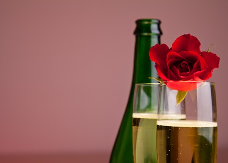 Valentine's day roses and champagne wine isolated on whiteの写真素材