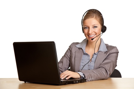 Woman in formal suit with headset isolated on whiteの写真素材