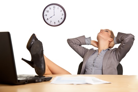 Businesswoman bored in office isolated on whiteの写真素材