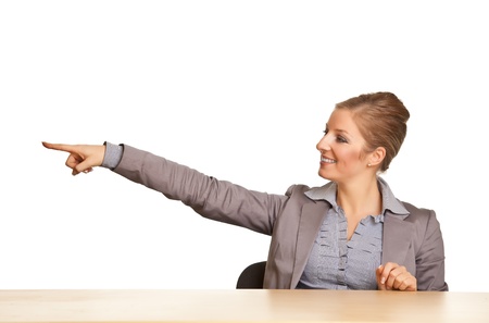 Businesswoman in suit pointing hand isolated on whiteの写真素材