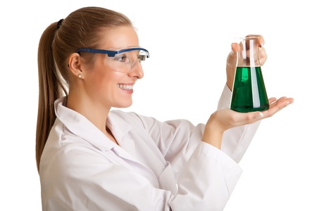 Isolated scientist woman in lab coat with chemical glassware の写真素材