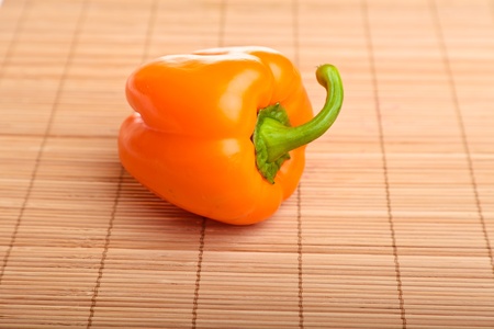 Different ripe vegetables compositions in studio laying on bamboo plateの写真素材