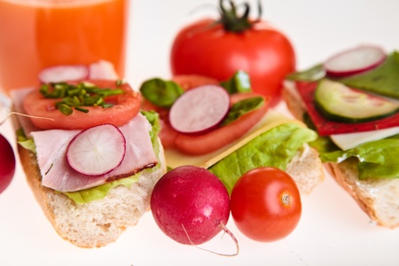 Different sandwiches with vegetables and cheese isolatedの写真素材