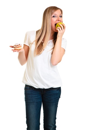 Blond caucasiam woman holding fruits isolatedの写真素材