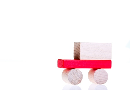 Wooden toy colorful blocks isolated on whiteの写真素材