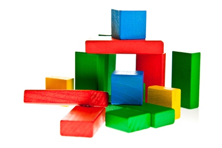 Wooden toy colorful blocks isolated on white