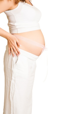Pregnant blond woman isolated on whiteの写真素材