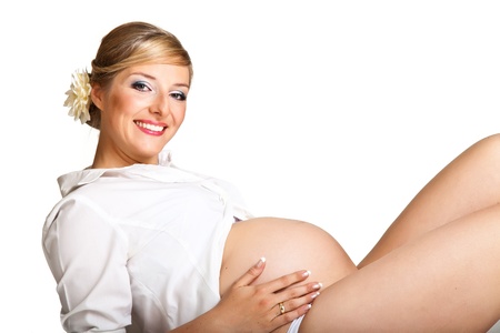 Pregnant woman isolated on whiteの写真素材