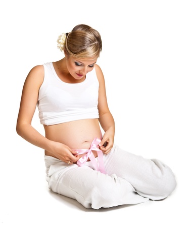 Pregnant woman isolated on whiteの写真素材