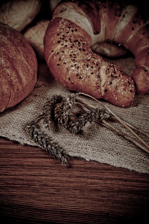 Composition of fresh bread on woodの写真素材