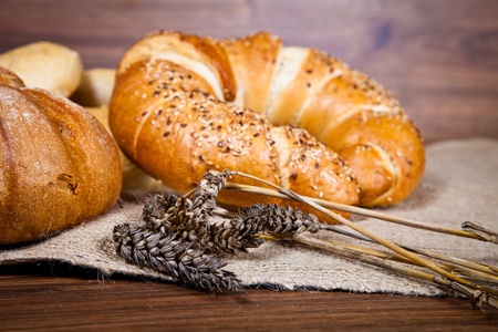Composition of fresh bread on woodの写真素材