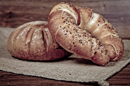 Composition of fresh bread on woodの写真素材