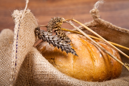 Composition of fresh bread on woodの写真素材