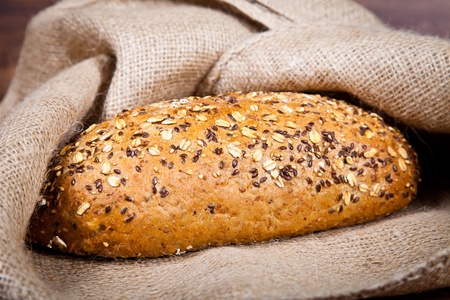 Composition of fresh bread on woodの写真素材