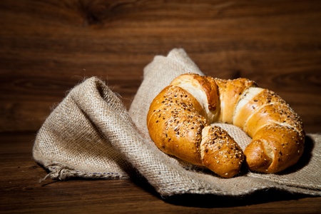 Composition of fresh bread on woodの写真素材