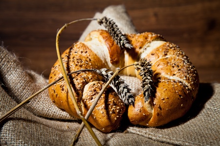 Composition of fresh bread on woodの写真素材