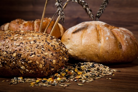 Composition of fresh bread on woodの写真素材