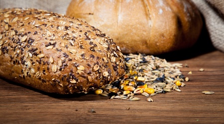 Composition of fresh bread on woodの写真素材