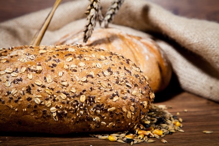 Composition of fresh bread on woodの写真素材