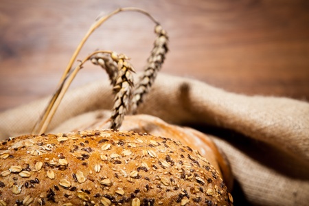 Composition of fresh bread on woodの写真素材