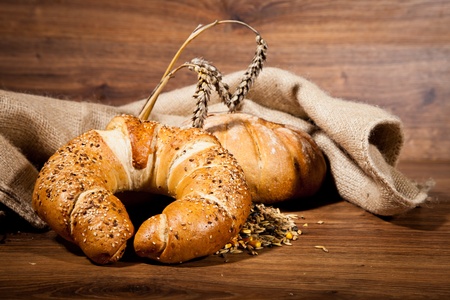 Composition of fresh bread on woodの写真素材