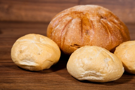 Composition of fresh bread on woodの写真素材