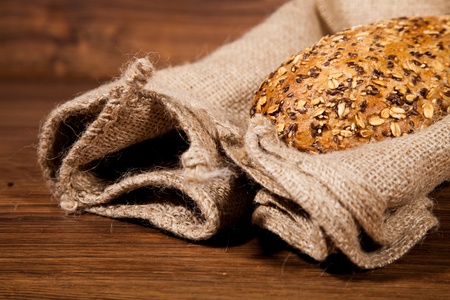 Composition of fresh bread on woodの写真素材