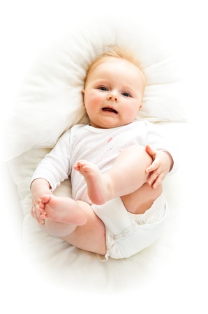 Beaufiful caucasian infant baby girl isolated on whiteの写真素材