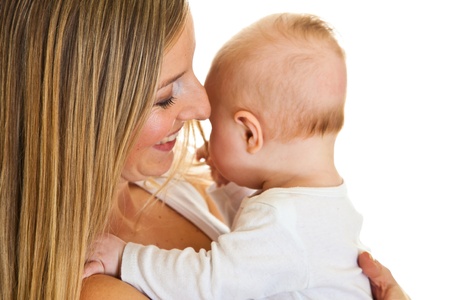 Mother with happy and cute infant baby girl isolated on whiteの写真素材
