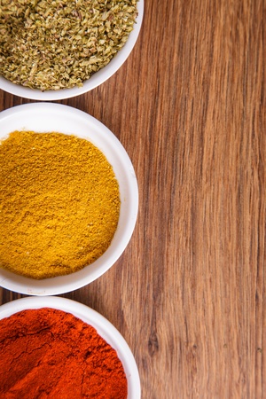 Frame composition of spices on wood, anise,cinnamon,pepper, laurelの写真素材