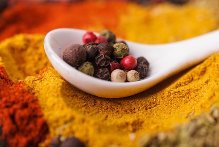 Closeup of spices composition, anise, cinnamon, paprica, curry, pepperの写真素材