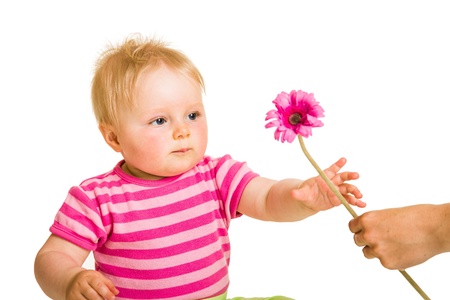 Infant girl giving flowerの写真素材