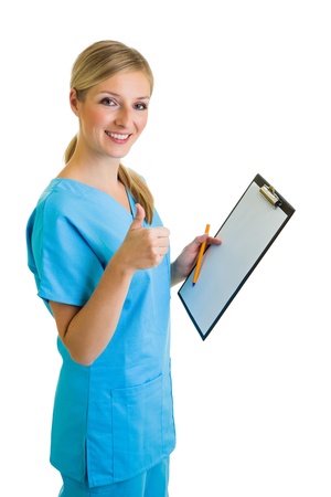Woman in medical doctor uniform holding clipboardの写真素材