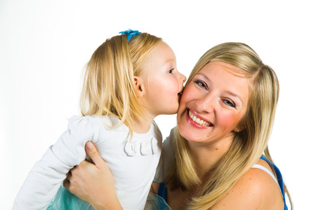 Pregnant woman with 2 zo daughter on whiteの写真素材